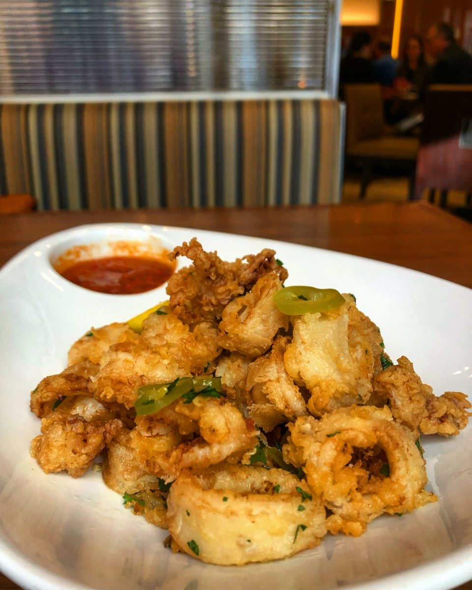 Adding some kick to the classic fried calamari with banana peppers and spicy marinara. 🐙

📸: new_fork_city/IG
