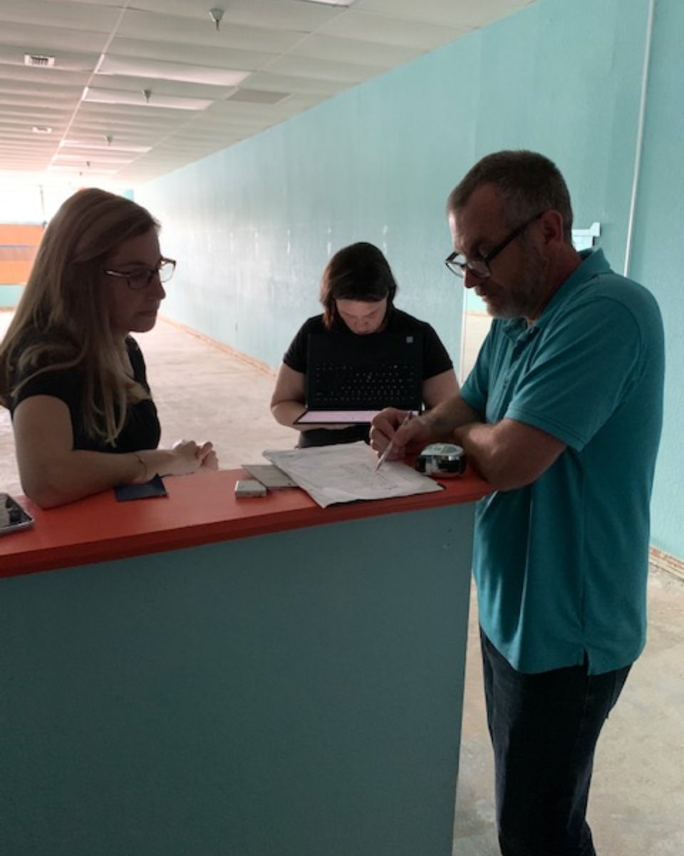 smilebuildersFL's tweet photo. WHAT'S THE WORD WEDNESDAY!? As we prepare for the new office, Dr. Robyn reviews design plans  Henry Schein Dental and cabinetry by Ciara Designs.....it's coming along! #NewOffice #Satellite #Dunedin #SmileBuilders #Expansion #Construction #Cabinets #Designs #BluePrint #CantWait https://t.co/CWxACMAi6Z