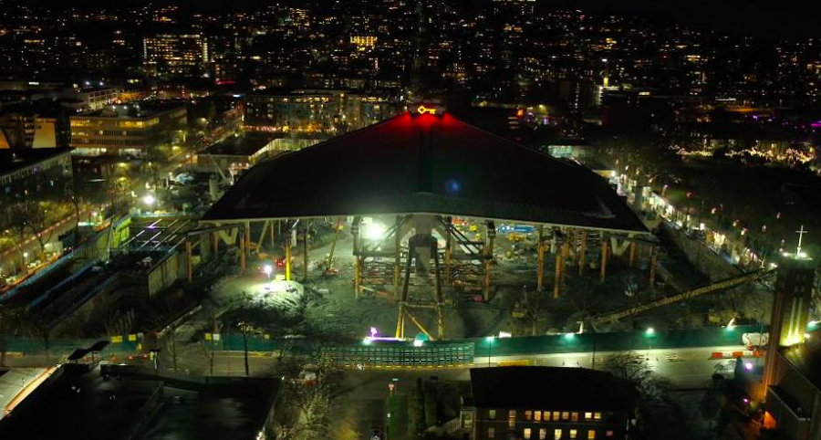 tdnewcomb's tweet photo. The historic Seattle Arena roof is now floating over what will soon be the new home of @NHLSeattle_. My @ForbesSports article on the floating roof and what to expect next https://t.co/RjUe3IXevV https://t.co/X5ajspLj5X