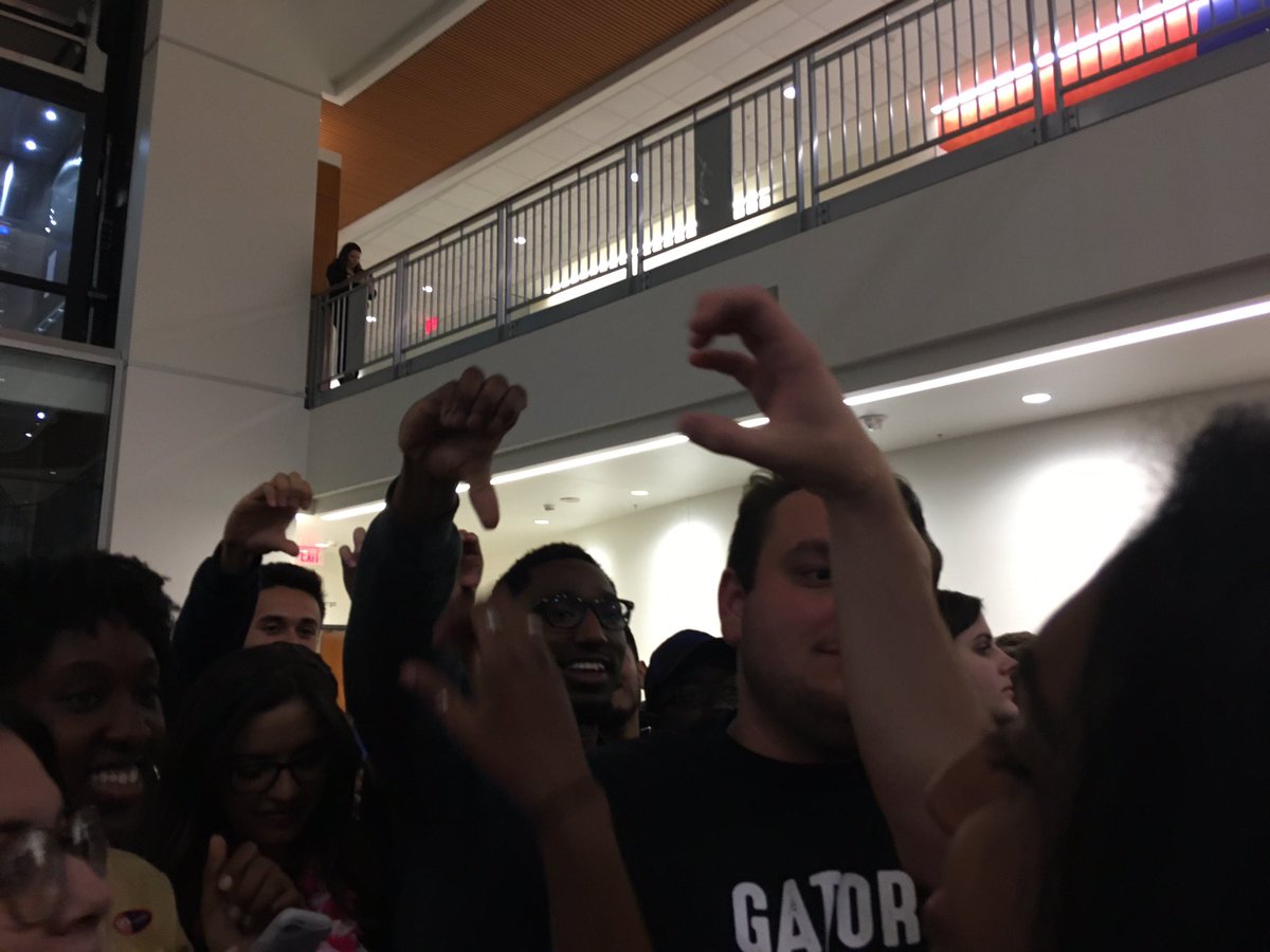 chasitymaynard0's tweet photo. Gator candidate for Student Body VP Lauredan Official is giving people in the crowd hand hearts. @TheAlligator #UFSG https://t.co/1HtrVYixv9