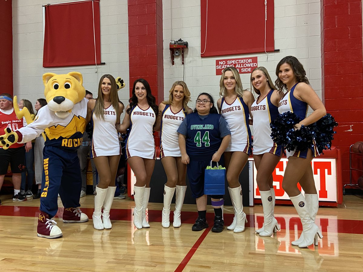 Trail content assistant, Kayla, is celebrated by Rocky and the Nuggets cheerleaders at her senior night.