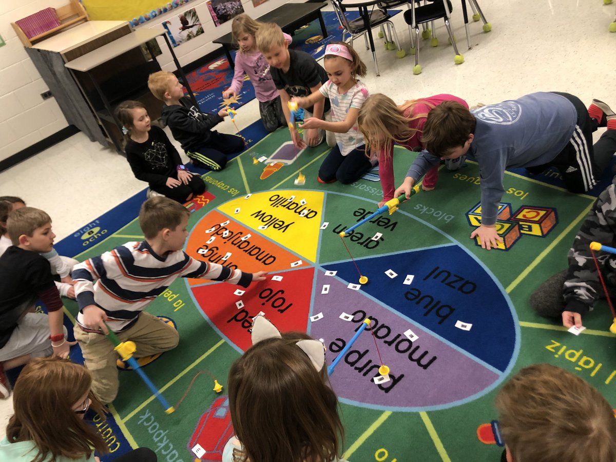 1st graders practicing Spanish vowel sounds by "fishing” them out in a team. Cannot wait to see how they help us recognize familiar and new spoken words in written form!
