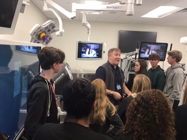 Aaron_M_Harrell's tweet photo. Mrs. Scarbrough’s students / MEDS Club members each got a turn to use the $2.5 million da Vinci Robotic Surgery machine at UT Southwestern - such an amazing experience! ⁦@Marcus_HS⁩ ⁦@scarbrough_ruth⁩ @UTSWNews #MarcusConnects #PrideInExcellence https://t.co/P6dWQIx4Km