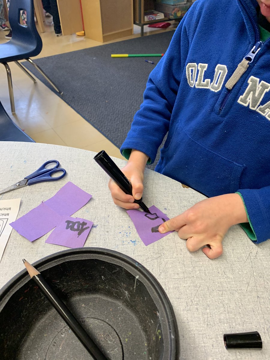 This student is preparing numbers cards beyond 100 as he is eager to continue counting the number of days we will be at school.