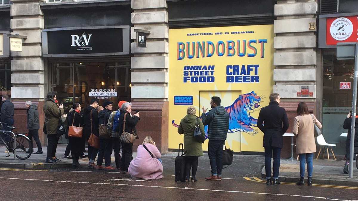Hartbrights hoarding for Indian street food and craft brewer @BundobustMCO draws a crowd. The company is set to open their second Manchester restaurant, complete with craft brewery, later this year.

#bundobustmcr #signage #signs #customsigns #customsignage #signmaker #signmakers