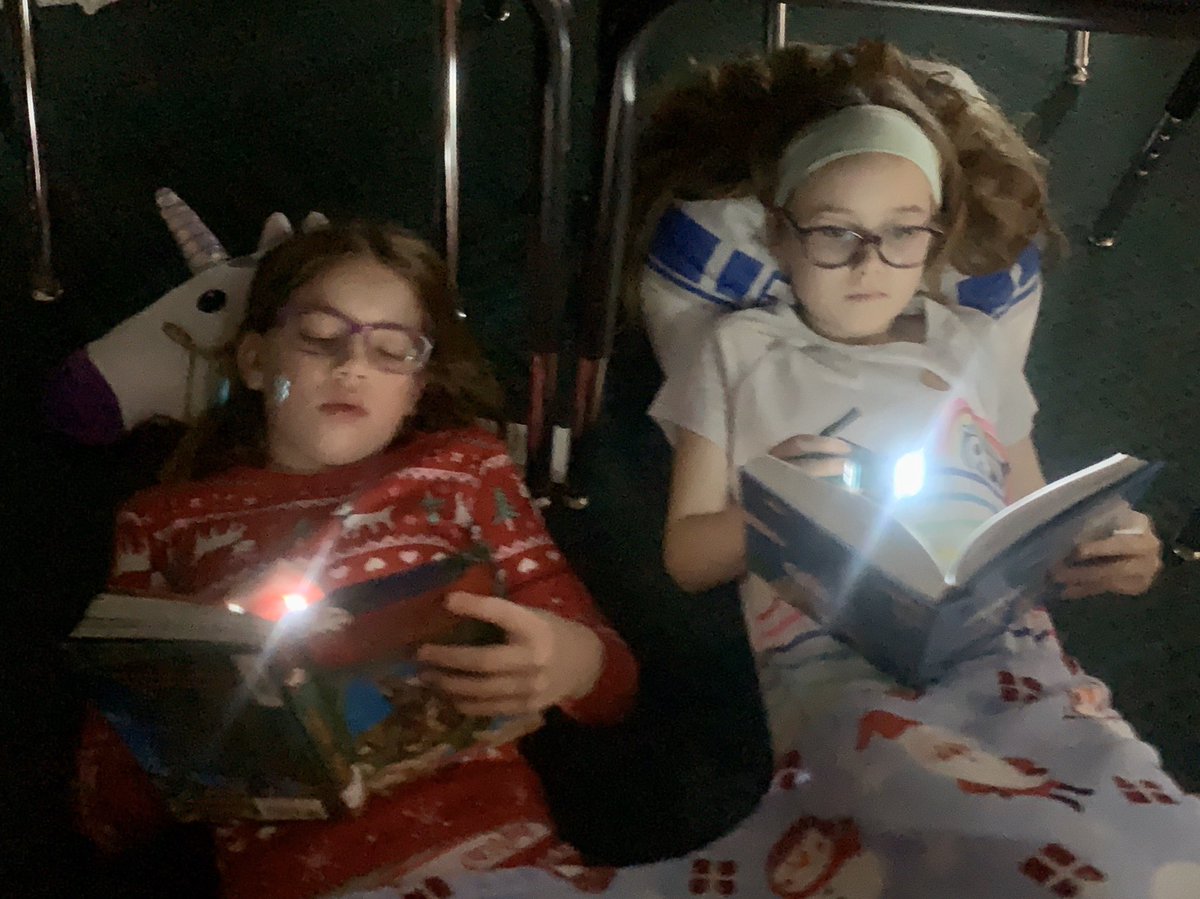 McGrane3rdClass's tweet photo. As a Boosterthon bonus, the class enjoyed Flashlight Reading today...in their PJs, too! Thanks for getting pledges! Only 2 more nights until our Glow Run! @McGrane3rdClass @ash1818 https://t.co/og6iQq5aVn