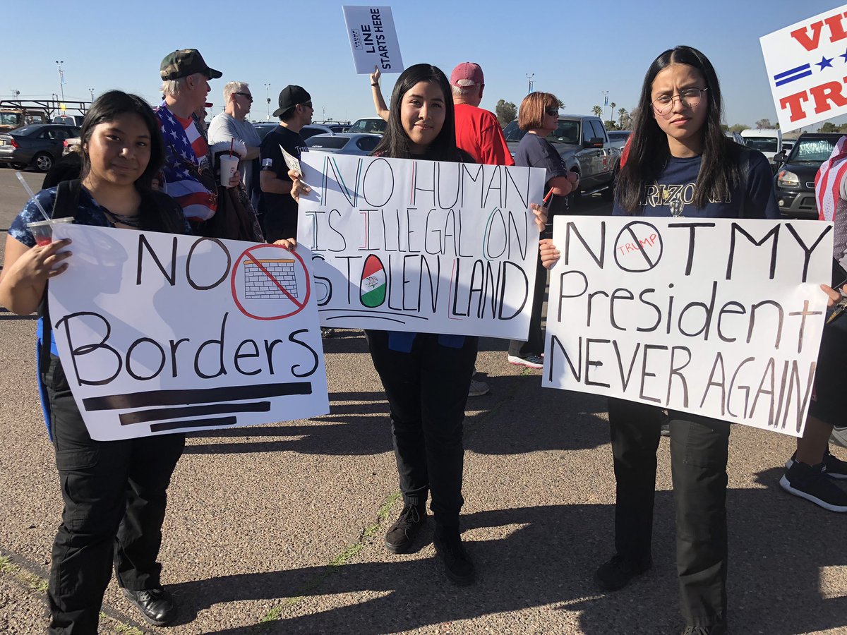 JavierArce33's tweet image. Holding banners with messages against #Trump, Amelie Sánchez and Aylin Valencia line up outside the Veterans Memorial Coliseum in Phoenix, trying to gain access to the Venue #TrumpinAZ #TrumpRallyPhoenix