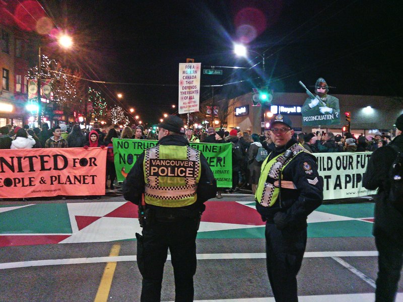 LesterMecca's tweet photo. Anti-pipeline marchers at corner of 1st and Commercial tonight in East Vancouver. Bold chanting supporting Wet’suwet’en hereditary chiefs.
#WetsuwetenSolidarity #pipelineprotest https://t.co/B57fwQy8MV