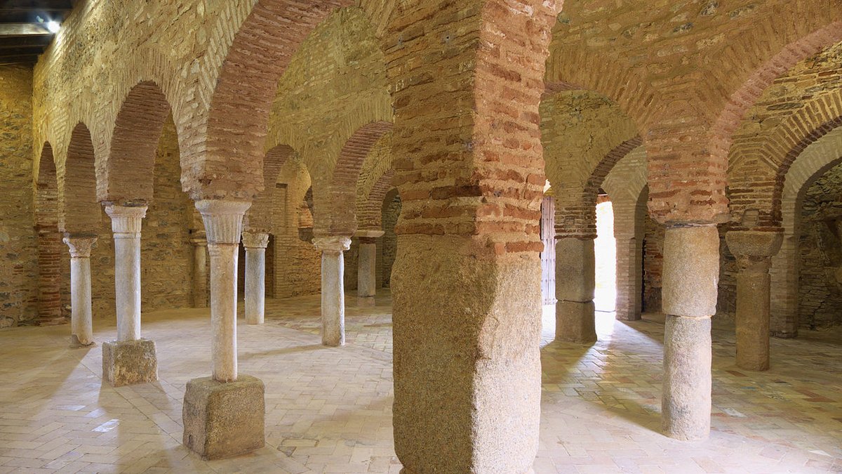 A "liwan" (from Persian "eyvān") a long narrow-fronted hall or vaulted portal that is often open to the outside. It is mostly found in Levantine houses.Liwan of the Mosque of Almonaster (Huelva, Spain) and an architectural drawing of a typical Levantine house.