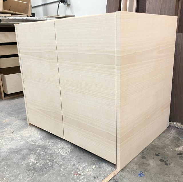 joethiele's tweet photo. Grain-wrap ash vanity in progress. Really nice wide veneers make up these panels—each slice was about 16” wide. Most of the grain is a rift/quartersawn grain, with the really beautiful highlights of the cathedral grain. This is the first time getting these panels sized and i… https://t.co/RFDvVAecVd