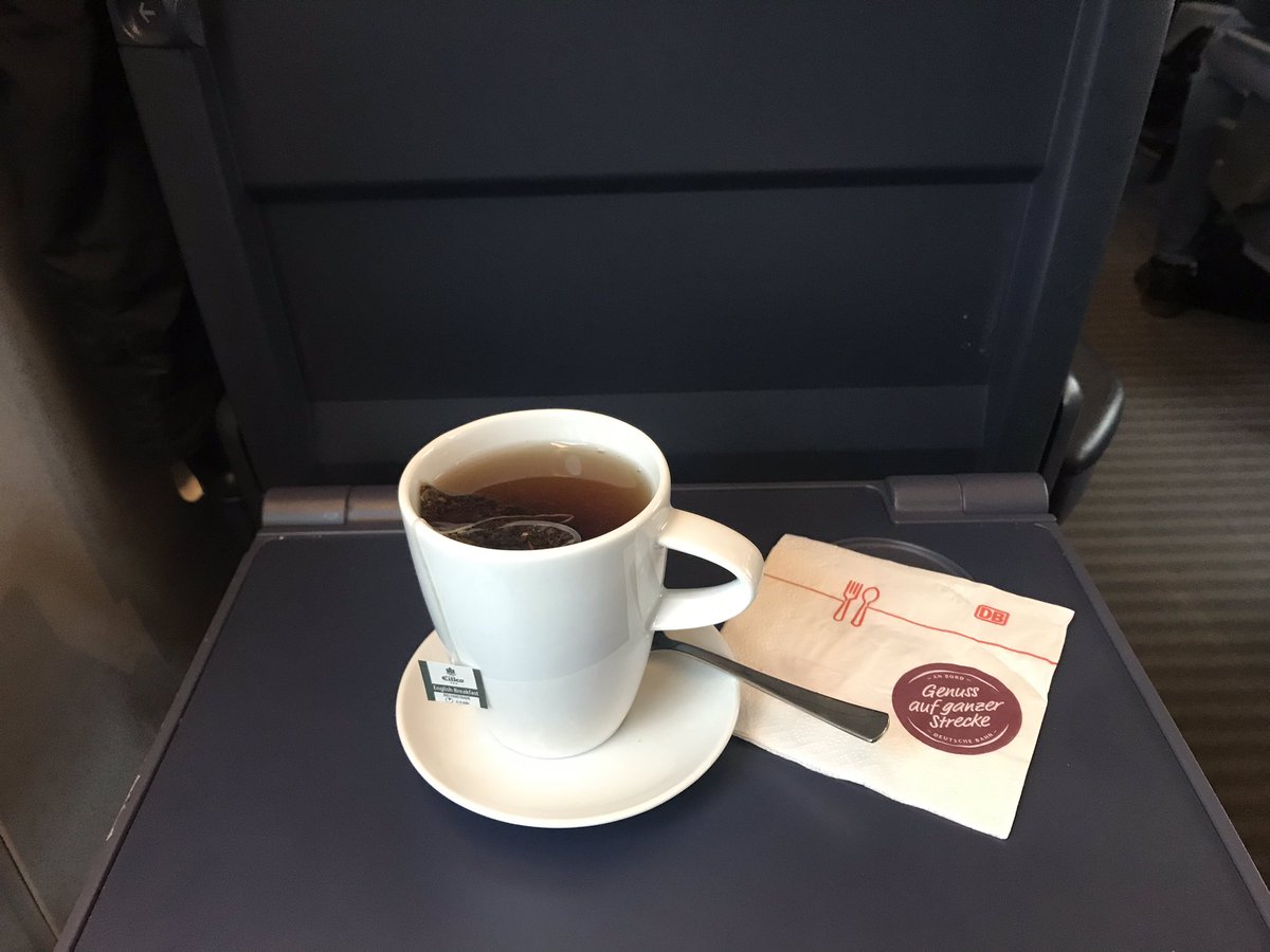 In first class on DB ICE they do an at-seat service from the onboard bistro - a guy walks around and takes your order, or there’s also a call button above the seat (!) like on a plane to summon them. I’ve ordered a cup of tea as proof of concept and it came in a nice real cup