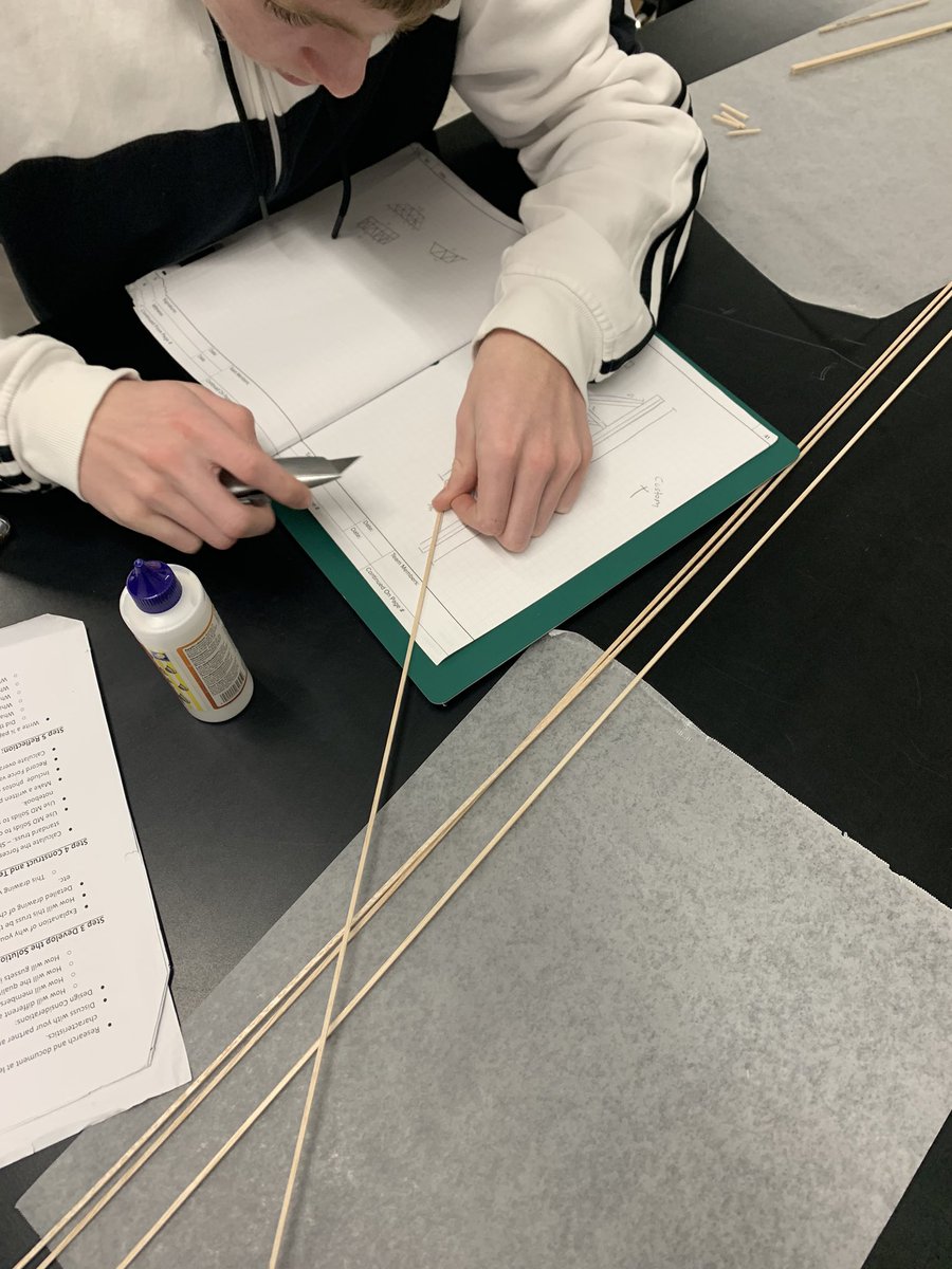 PLTW students working hard on their bridges!