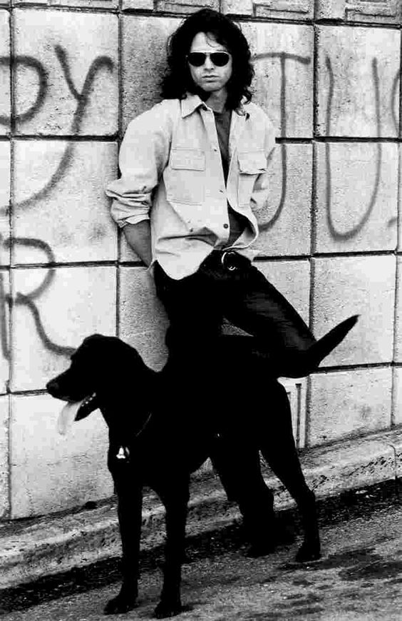 BoredWeb3's tweet photo. Jim Morrison with his black lab dog.

#LoveYourPetDay https://t.co/HO7pkiHzht