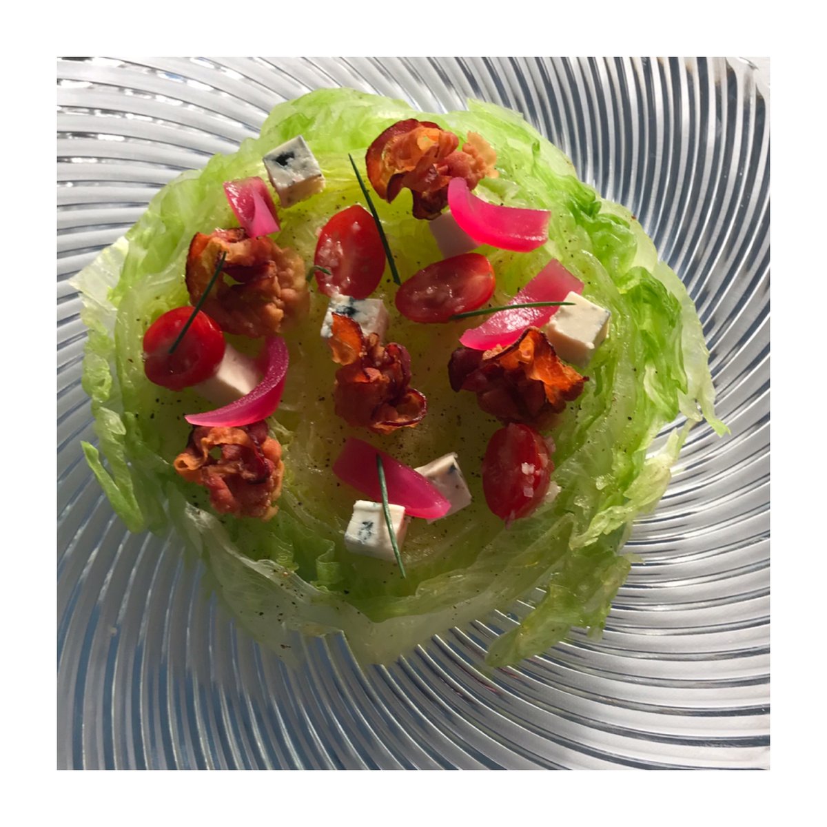 Cool, crisp, and colorfully delicious! Super Chilled Iceberg Salad, topped with Applewood Smoked Bacon, Marinated Tomatoes and Maytag Blue Cheese. #TheSurfClubRestaurant #TheSurfClubMiamiBeach #SurfsUpSince1930