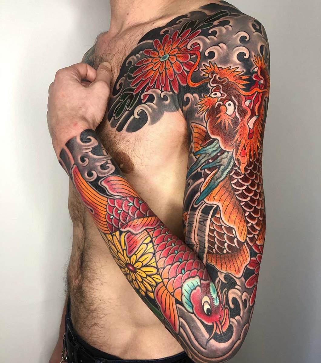 Update More parts of the traditional Japanese sleeve done just need the  tiger and dragon colored All work done by Andrew at Pyramid Tattoo in  Boise ID  rtattoos