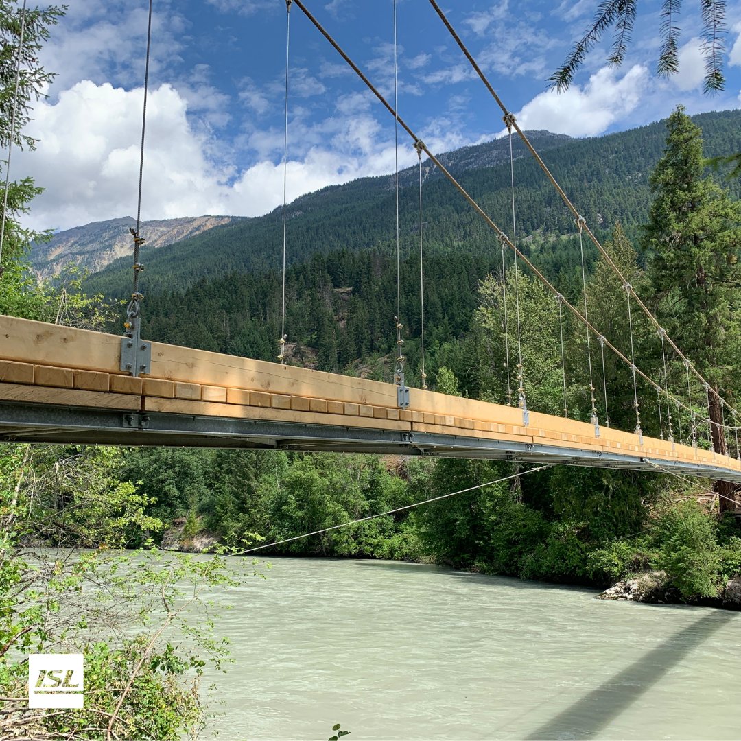 ISLengineering's tweet photo. ISL provided Structural Design for this beautiful new private pedestrian bridge which is still in construction over the Permberton River! #BC #bridge #private #structural #design #construction #pemberton #pedestrian #suspension #pedbridge #wood #structuraldesign https://t.co/HQqLgoDBOT