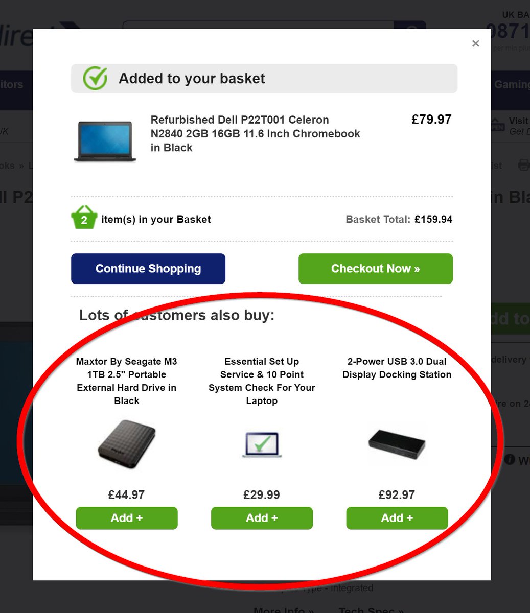 Often retailers like that have KPIs like 'attach rate', putting UX elements in place to maximise the likelihood someone buying a laptop will also buy a cable/bag/docking station/warranty/setup service.A bit like mobile phone shops trying to sell you tons of add ons.