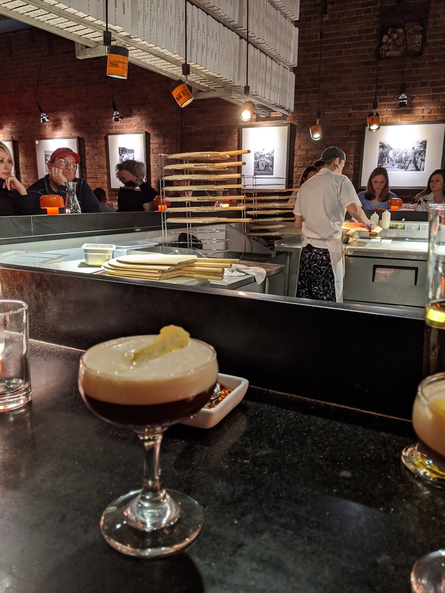 MonzaPizzaBar's tweet photo. Thursday lunch scenes.  Take a tip from Matt S. — grab an Espresso Martini and a front row seat to the action at our pizza counter.
#monzapizzabar #thursdays #kitchenscenes https://t.co/fHn9LHLtLM