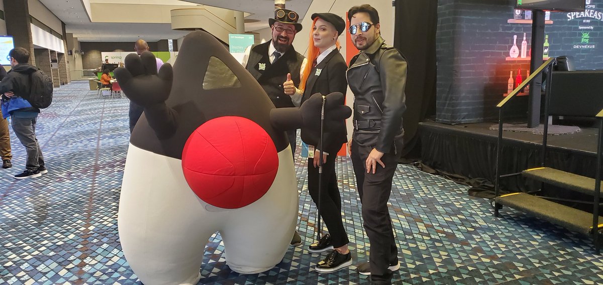 jfrog's tweet image. The @DevopsSpeakeasy crew photobombing the #javaduke! 
Only at #devnexus 😜