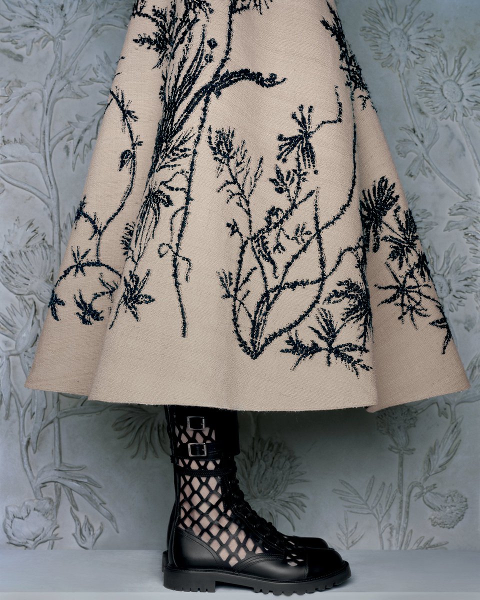 Dior's tweet image. For #DiorSS20, timeless House signatures are given a makeover by Maria Grazia Chiuri that speaks of pastoral pleasures, from the #DiorBookTote to the legendary #DiorBarJacket, floral embroideries to the straw hats, available now on.dior.com/ss20 and in boutiques worldwide.