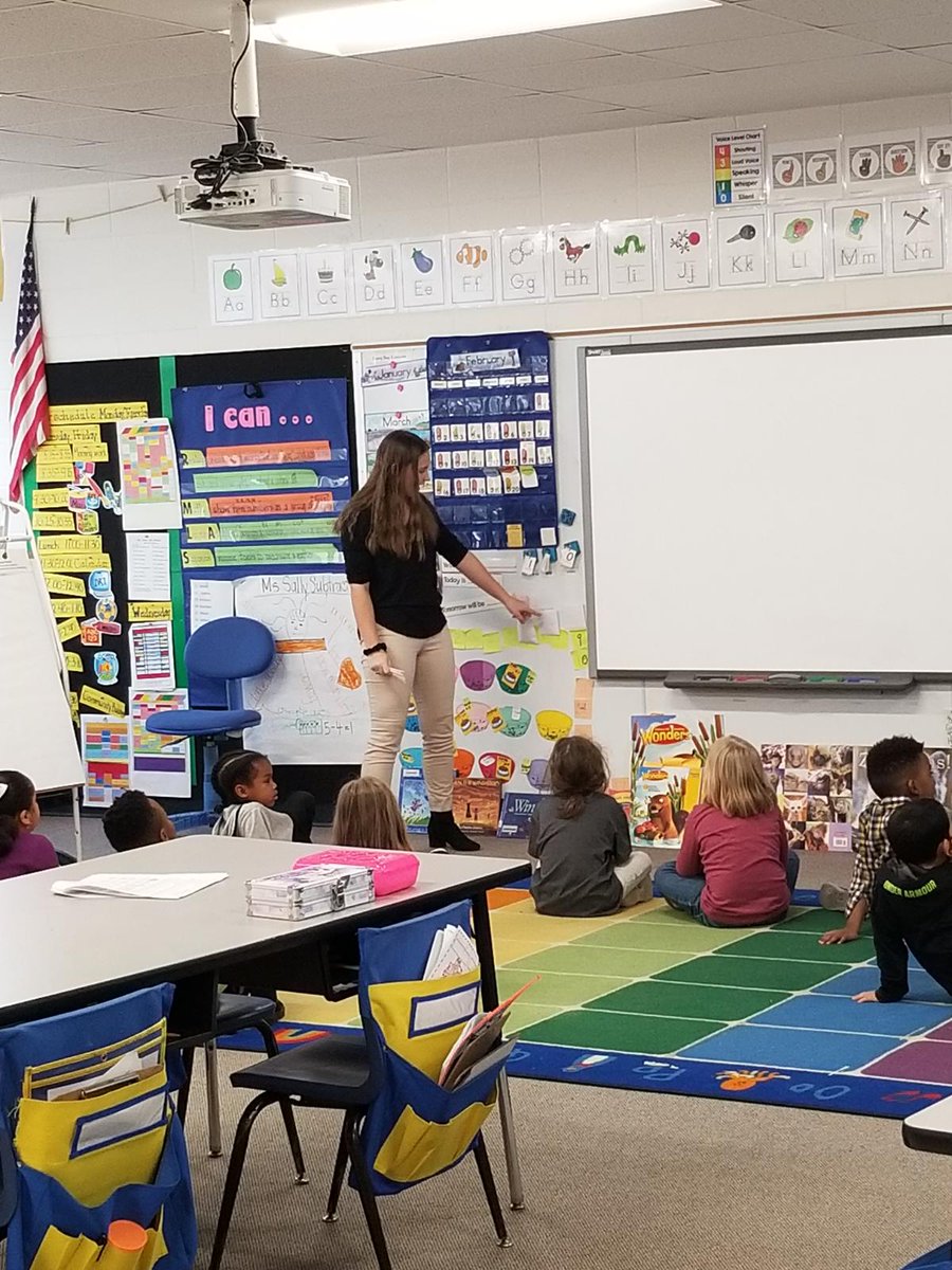 SouthlandCAPS's tweet photo. Bailey is teaching calendar math with her kindergarten students in Mrs. Evan's room, while Tanea is teaching students how to tell time in Ms. Osterman's 2nd grade class. Both Education Exploration students are placed at Spring Valley Elementary in the @RaytownSchools.  #SCAPS https://t.co/pPDRfgdCVy
