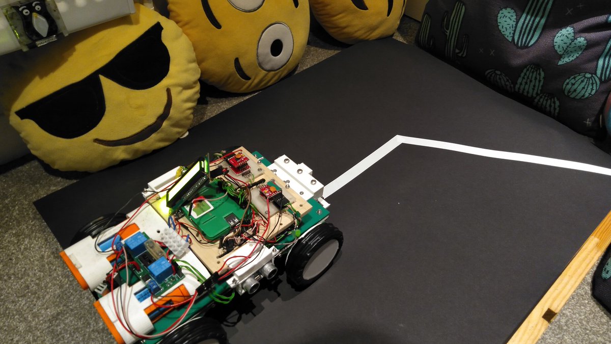 OtterRobotics's tweet photo. Our #PiWars robot ready to be tested with the line following functionality. Infer what you may from the pillows around the side but better be safe than sorry. 🤓 https://t.co/ncxSjI4T8w