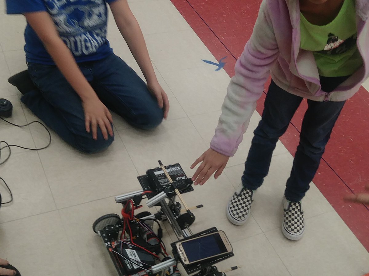 CluteRobotics's tweet photo. STEAM night @VelascoElem @VelascoLab ! Team Aries &amp; Humpty Dumpty making robots real to 1st-4th grades. Tonight he played 'Fetch' and answered questions. Reach out &amp; make it real! @FIRSTinTexas @FTCTeams @CluteCougars @BrazosportISD @tmfulton1 @AprilSWhitehead https://t.co/QsRJU3sm8I