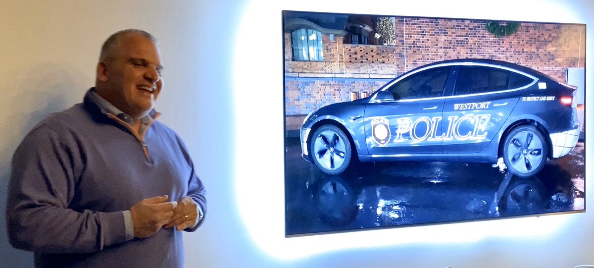 paulbraren's tweet photo. Took video at tonight’s #evclubofct event w/ world’s first @Tesla Model 3 police car that uses the motor’s battery (instead of the 12V) for lights & accessories. Gas cars in same traffic enforcement role get ~10 mpg, idling a lot. https://t.co/n558ntO5Pj @TecKnowMe @wptEVclub https://t.co/wqgewkDKl0