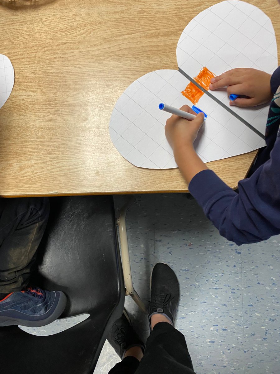 sarahcopp7's tweet photo. Using a line of symmetry to colour both sides of a heart. @EY_uwindsor https://t.co/SQ9wTwti0C