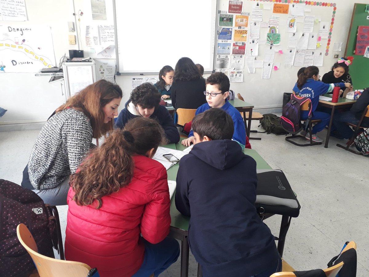 RHHS_PYPX's tweet photo. Grade 5 students thinking of their inquiry questions and writing their central ideas and lines of inquiry with their mentors #pypx https://t.co/o9unIp1DWm