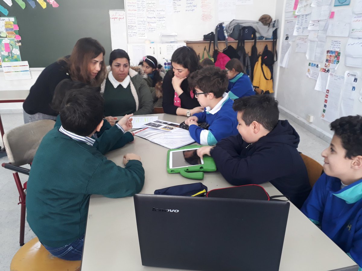 RHHS_PYPX's tweet photo. Grade 5 students thinking of their inquiry questions and writing their central ideas and lines of inquiry with their mentors #pypx https://t.co/o9unIp1DWm