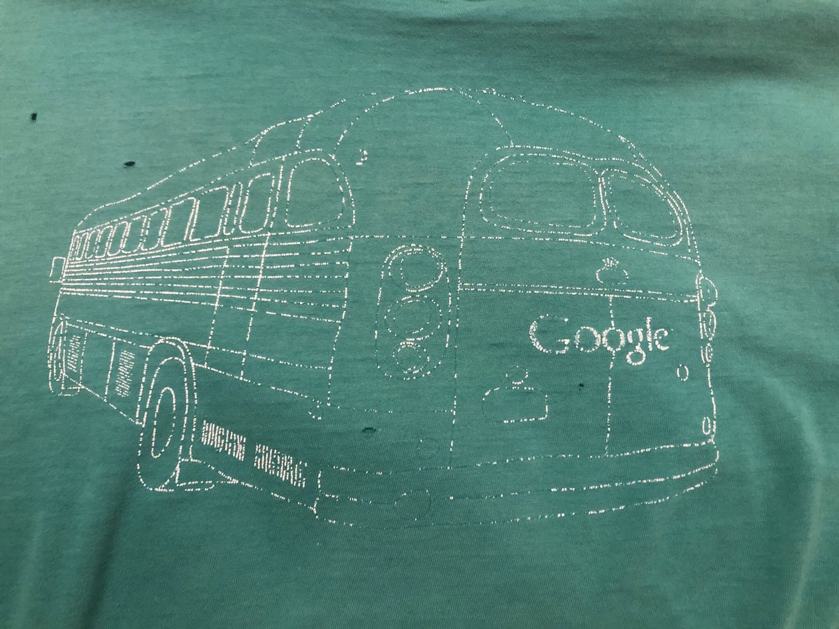 JojoRzans's tweet photo. Who remembers the original @Google bus?? Found my t-shirt from when we shifted to Gmail at my university and they brought it on site. #googlebus #tamingdragons #gmail #retrogeek https://t.co/wzRkcXwFvV