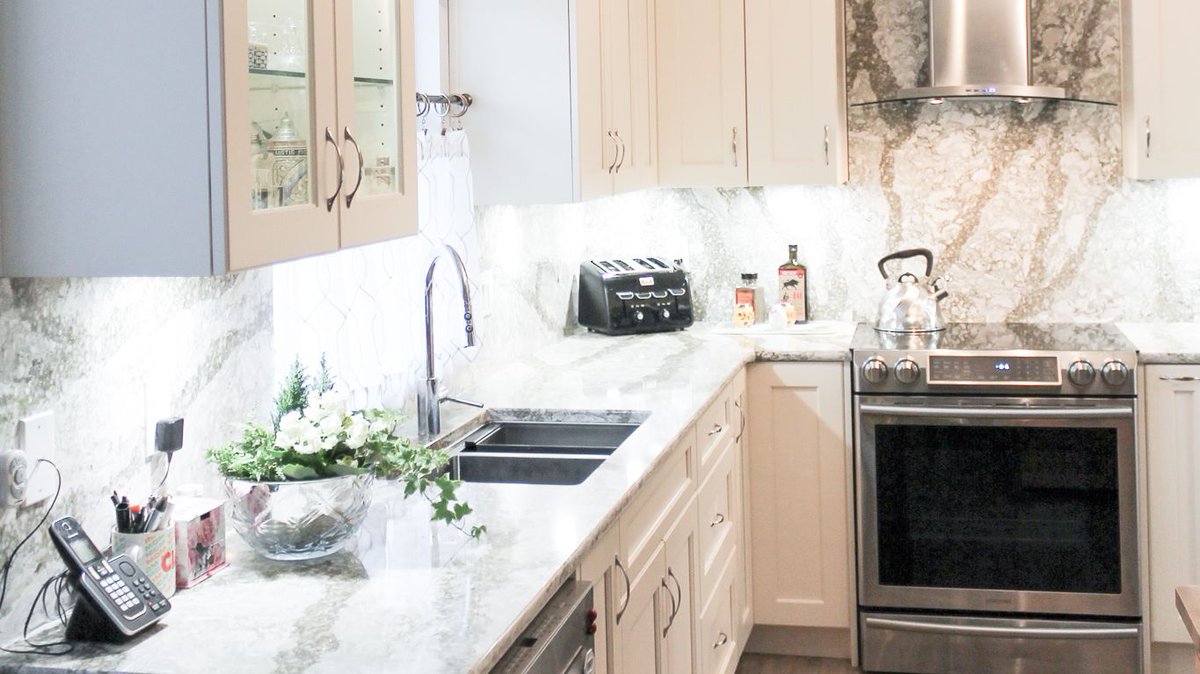 WorksCabinet's tweet photo. A warm and inviting white kitchen is always in style #kitchens #whitekitchens #cabinetry #cambria #Galloway #glassdoors https://t.co/5qACj38fib