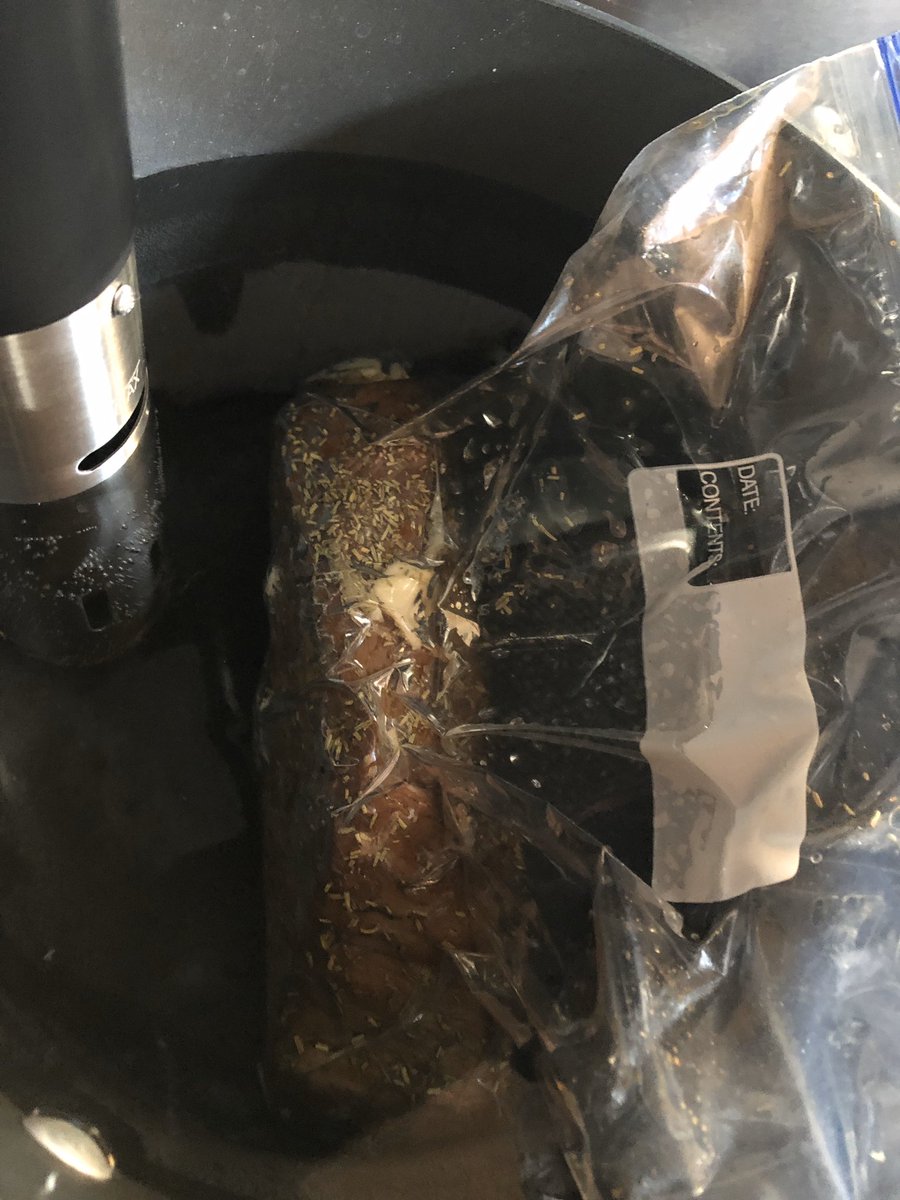 MMasonDCroz's tweet photo. Trying something new. Bottom round roast, seared with butter, seasoned with salt/mashed garlic/rosemary, cooked at 130°, sous vide for 25hrs. Then sear it one more time and serve for dinner tomorrow. It’s 6hrs in, and it smells good. Real good. #Yum #Dinner #CulinaryExperiments https://t.co/6fIc1IORLa