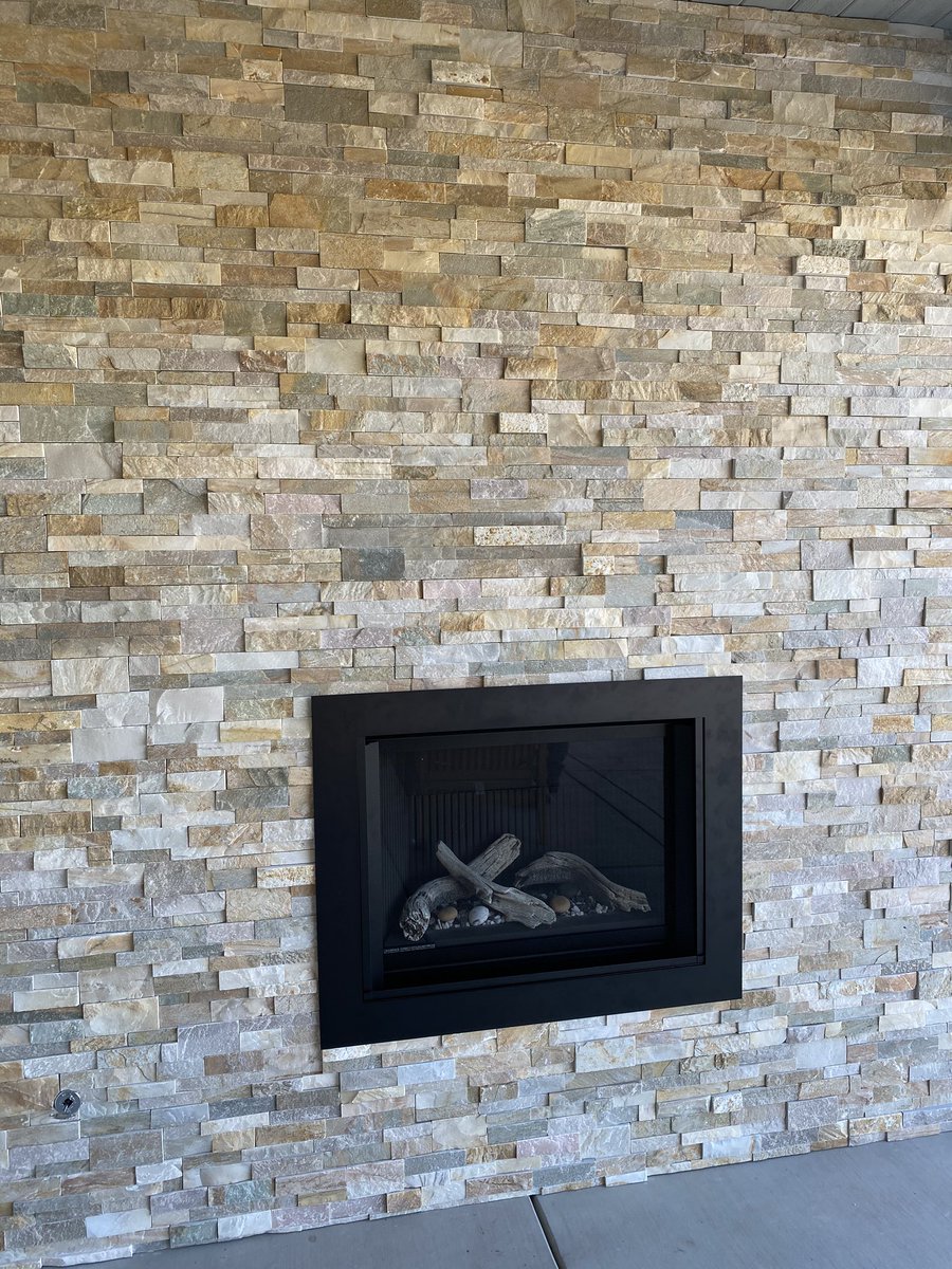 RedtailReno's tweet photo. A patio fireplace is a great choice to warm up those cool central coast nights    #fireplace #stackedstone #redtail #renovation #remodel #tileco https://t.co/XpMOtUo6n4