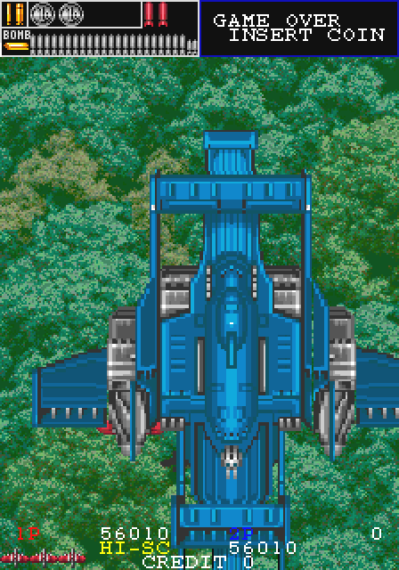 2面は敵が全く出ない、弾を撃たなくて良い、時間があるという“間”が存在することはシューティングでは異例。そして、轟音が先に鳴り始め大型の輸送船団が次々に降下してくるシーンが印象的。ボムで落とすと1万点入るという仕様は大失敗だったとプログラマーのたらばーさんは当方のガンフロ本で語った。