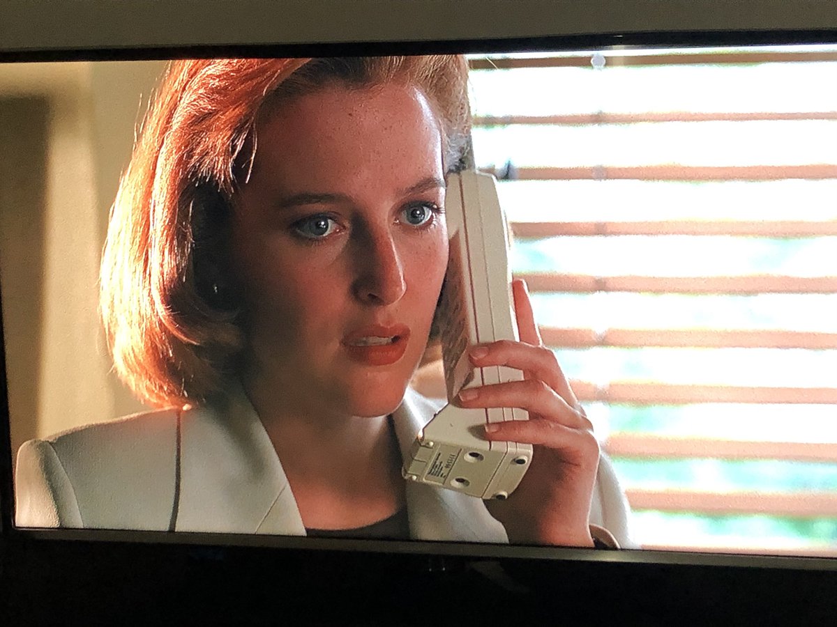 It is also about talking into comically enormous 90s phones.