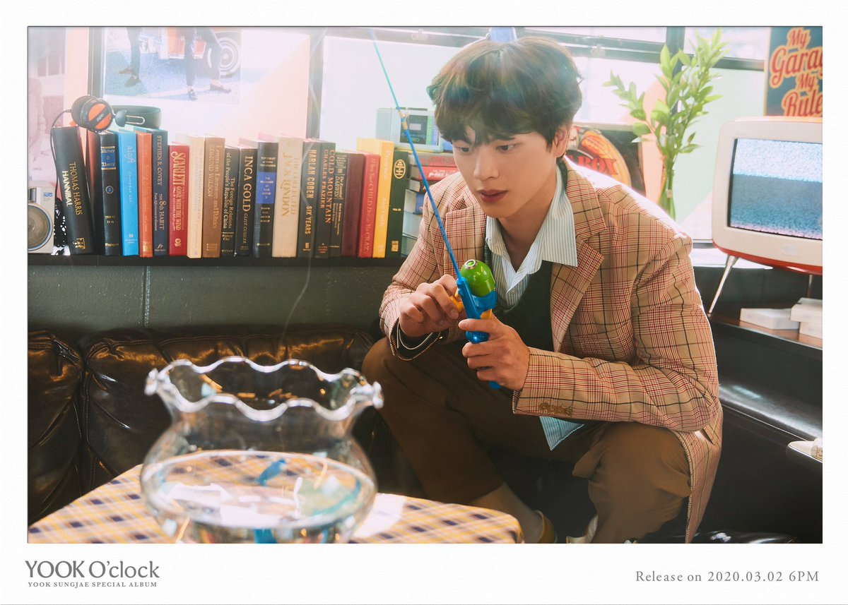 BTOB's Sungjae fishes in adorable concept images for 'YOOK O'clock