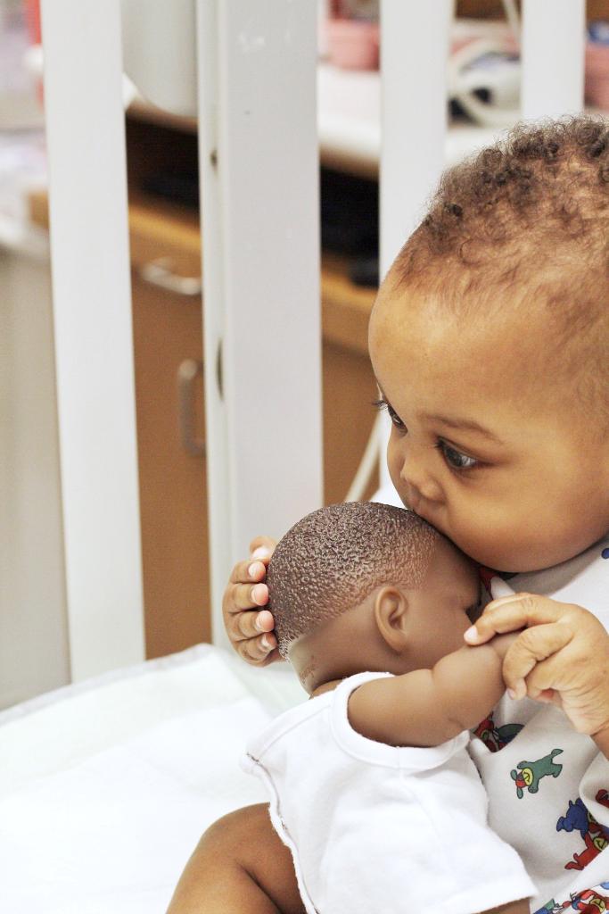 StJude's tweet photo. Last year, we shared a photo of patient Sparrow with her baby doll. This year, she’s traded her toy in for cuddles with her new baby brother! Sparrow is still in treatment for infant acute lymphoblastic leukemia but is doing great. https://t.co/NnD6XKx1Ai