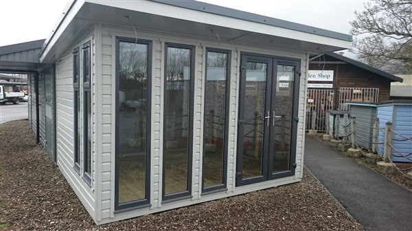 Here is a new display we have.  The building has upvs windows and doors and has been painted inside and out using Johnstone's opaque (oil based) wood care. The colour is RAL 7038.  Inside it's insulated, lined has electrics.