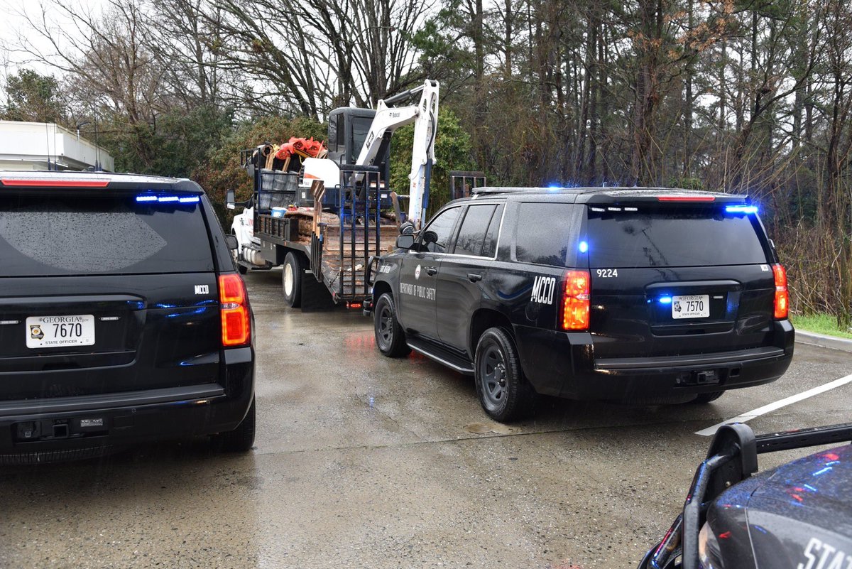 ga_dps's tweet photo. Yesterday, MCCD in conjunction w/ the @gbi_ga Major Theft Unit, held a detail to locate stolen heavy machinery in the Metro Atlanta Area. In poor conditions of heavy rain the detail was able to locate a skid steer loader valued at $22,000. Great job Officers &amp; Agents! #gamccd https://t.co/yAio95FdaB