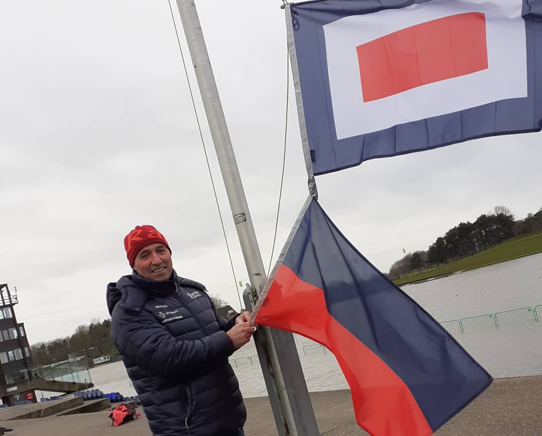 emwiggsy's tweet photo. With the flooded lake in the background it's never been more important that we take #ActionForClimateChange very proud to have raised these flags as a @BritishCanoeing #Paracanoe squad to highlight the need for ACTION. Please @10DowningStreet take notice, listen &amp; take ACTION!! https://t.co/0ot66nm4kC