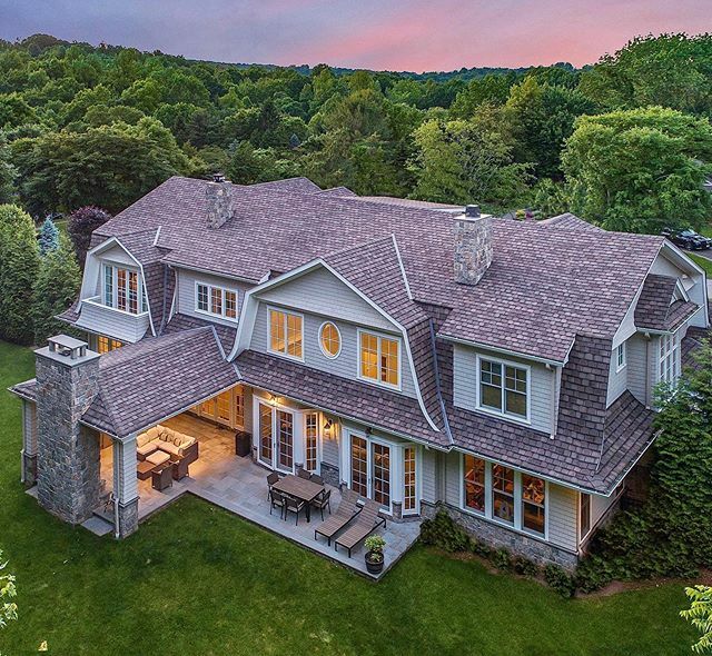 Architects_LLC's tweet photo. Hampton style house with intersecting Gambrels, careful integration of shed dormers, master bedroom balcony, covered terrace,  and other ornamental architectural details.  Design by @jordan_rosenberg_architect  and built by @parkhilldevelopment https://t.co/YJdvf3969k https://t.co/bJce11QMHf