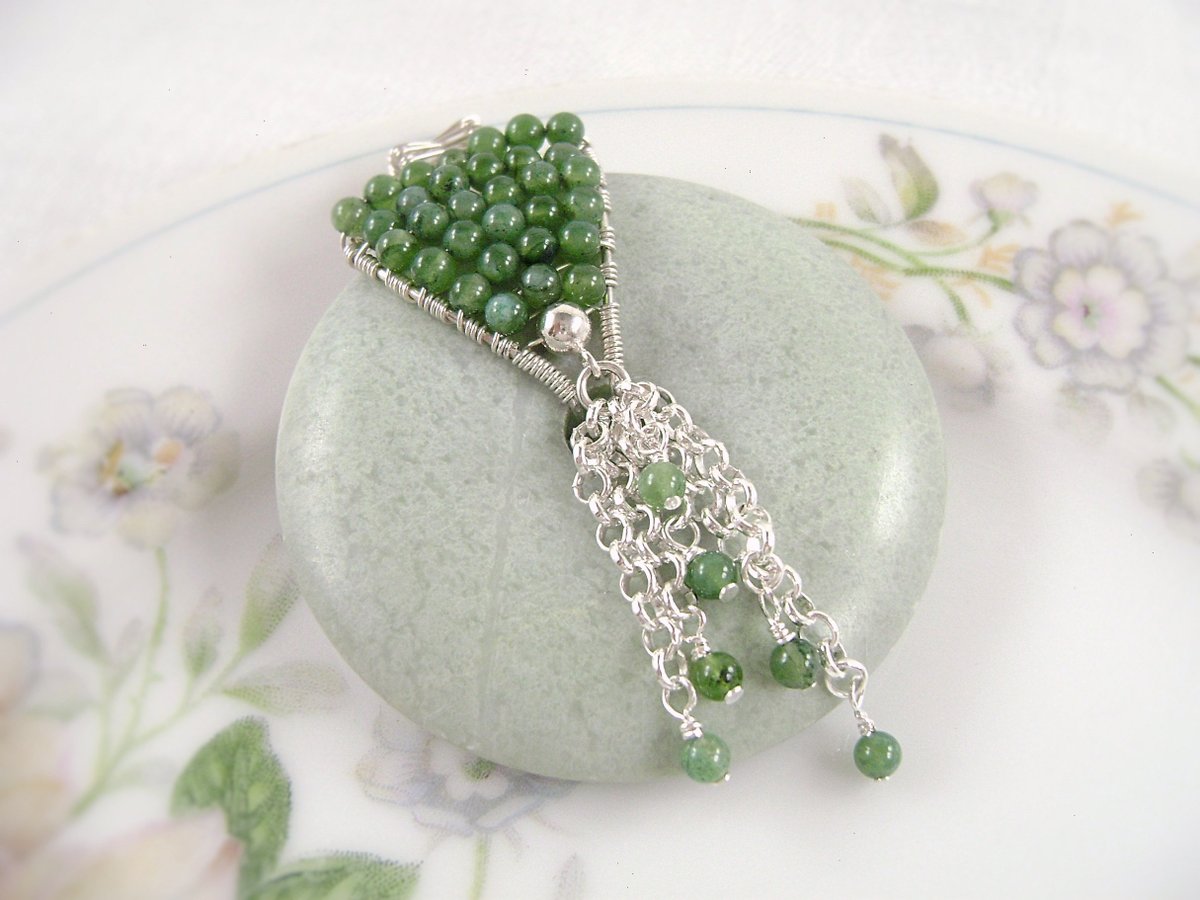 Save 15% + FREE SHIPPING on $35+ in my #etsy shop #GreenJasper Pendant #SterlingSilver #WireWrapped #CeladonGreen #MariesGems #EtsyHandmade #ListMyEtsy #JasperJewelry Lovely green jasper donut pendant with olive quartz & 925 silver chain etsy.me/2vQBnPW