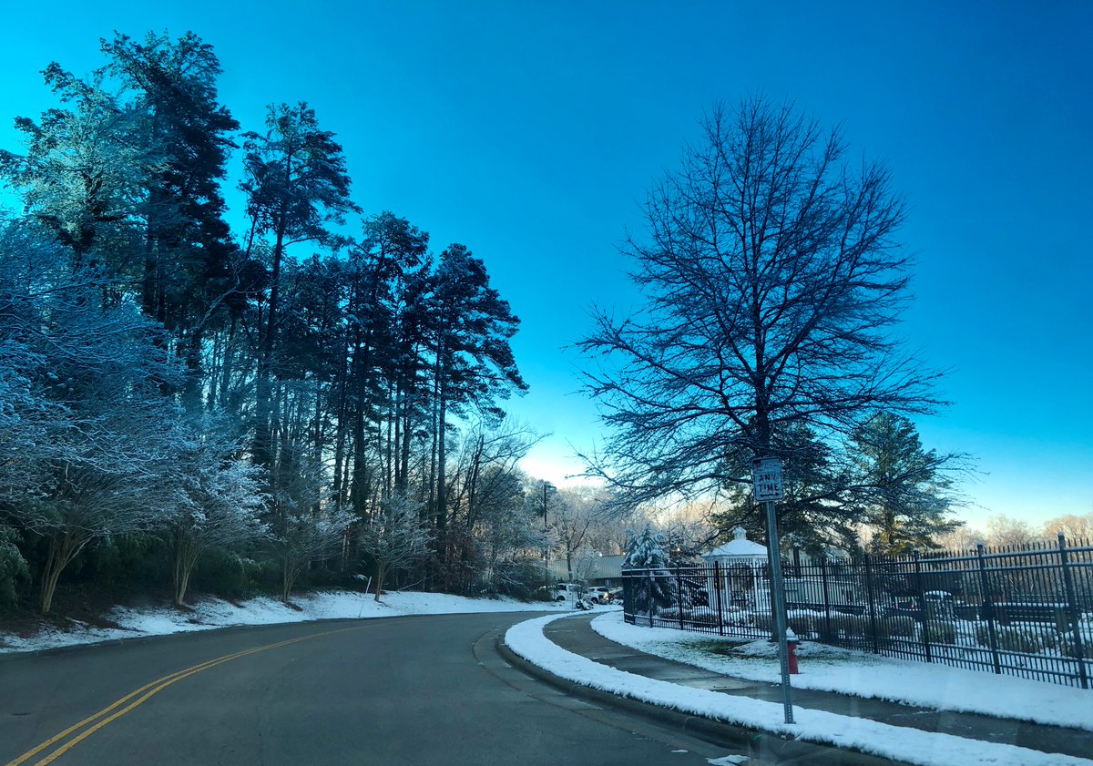 DukeRaleigh's tweet photo. There's still a little snow on grassy areas of our main campus, but crews have been hard at work preparing our walkways and roads for you today. To our team members, patients, and visitors, please do remember to allow extra time and use caution when traveling today. #pictureduke https://t.co/oW1xSM7RJY