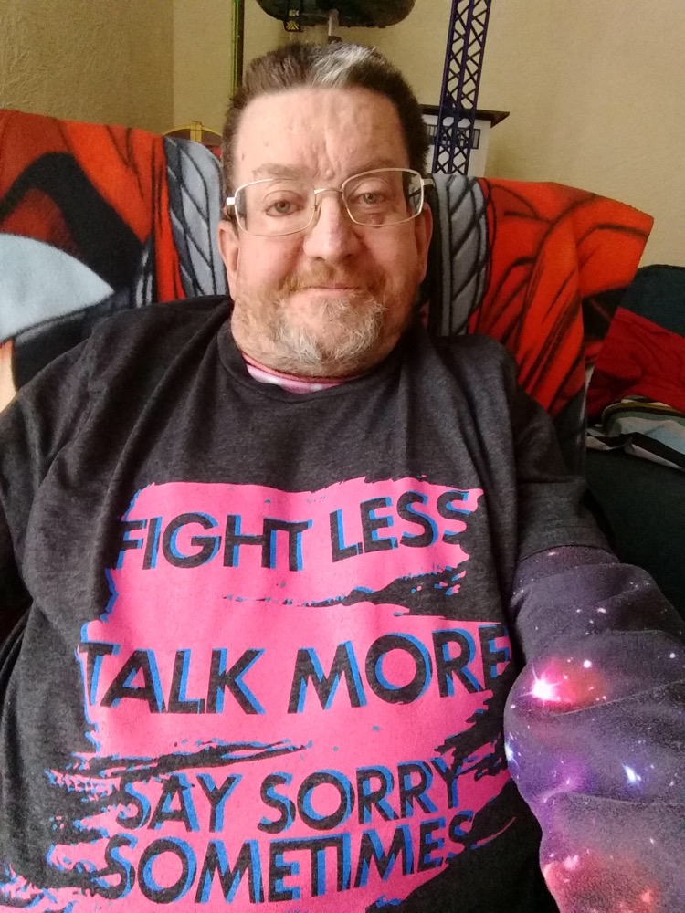 PVBuk's tweet photo. Wearing my new #FightLess @CatawampusInk shirt and the new sticker added to my laptop. 😊😎👍🏼❤️ https://t.co/I4H6lZJJuv