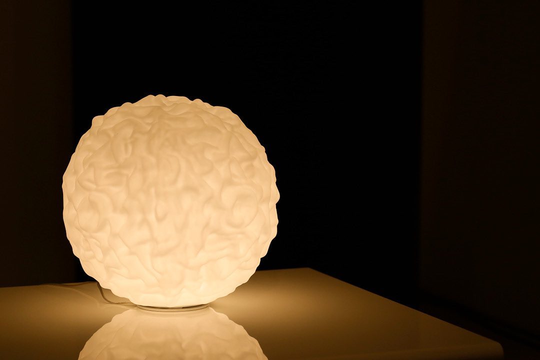 Emisfero by Icone Luce featured at #IMADElondon.⁣
⁣
A diffuse-light lamp in hand-blown triplex multi-layer white glass of irregular shape, with acid-etched finish.⁣
⁣
Applications are now open for I-MADE 2020 exhibitors: i-made.co.uk