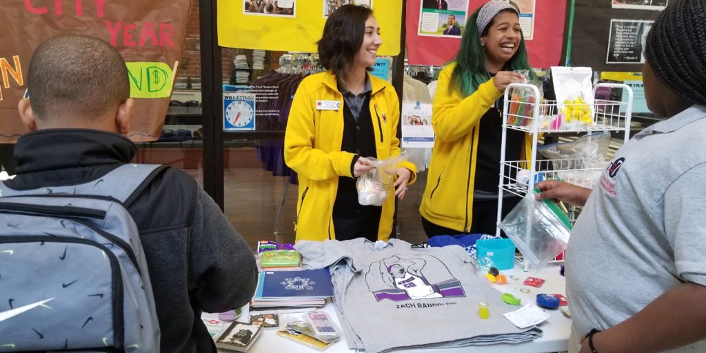 CityYearSAC's tweet photo. We care deeply about attendance because it is imperative to academic success. City Year at St. HOPE launched the Banana Stand as part of their attendance initiative! Scholars are rewarded with Banana Bucks, they can later claim prizes with, for each day they are present. #CYsac https://t.co/DVj4Rgyzv3