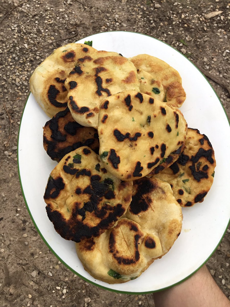 snap_forest's tweet photo. Four breads cooked on the campfire @snapweston holiday club. Rye sourdough, rustic white, soda bread and garlic naans. Each one has gone down a treat! #snapforest #outdoorlearning https://t.co/TKrYPPDF4j