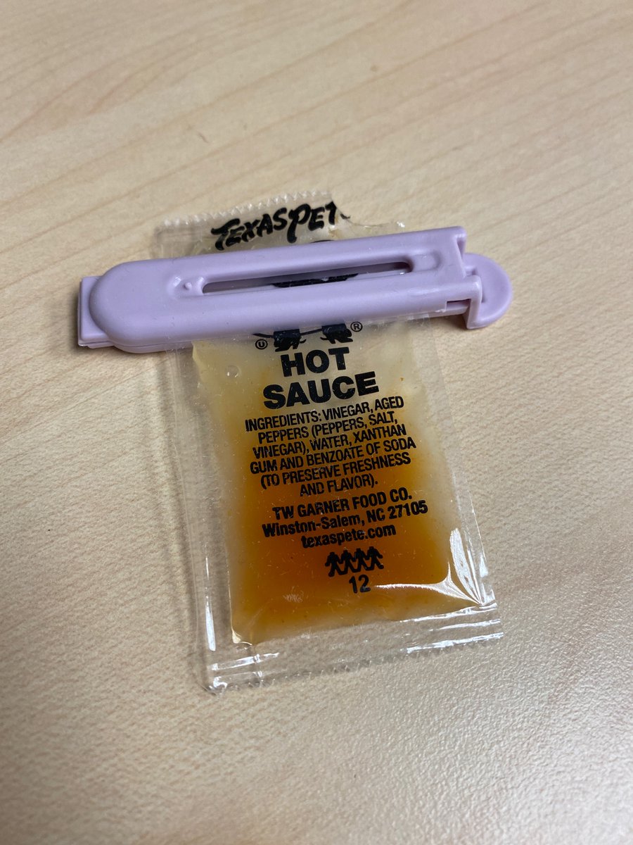 amkirk's tweet photo. Someone in my office thinks it’s important to save this 1/3rd packet of Texas Pete https://t.co/T5KJDpEmux